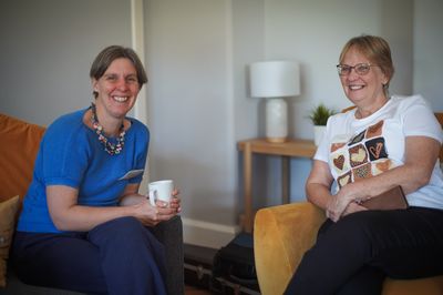 Two female students enjoying coffee break during CYf residential