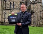 Bangor Defib and Bishop David.jpg