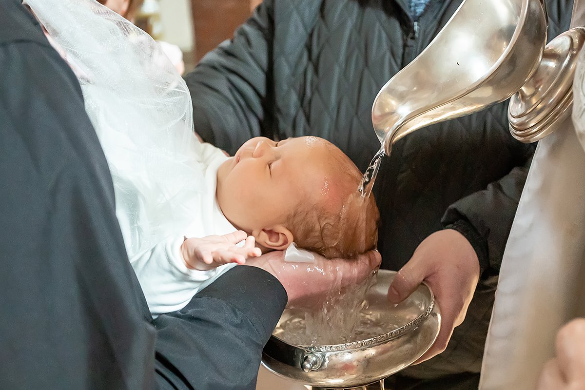 Baptism of a baby at the font