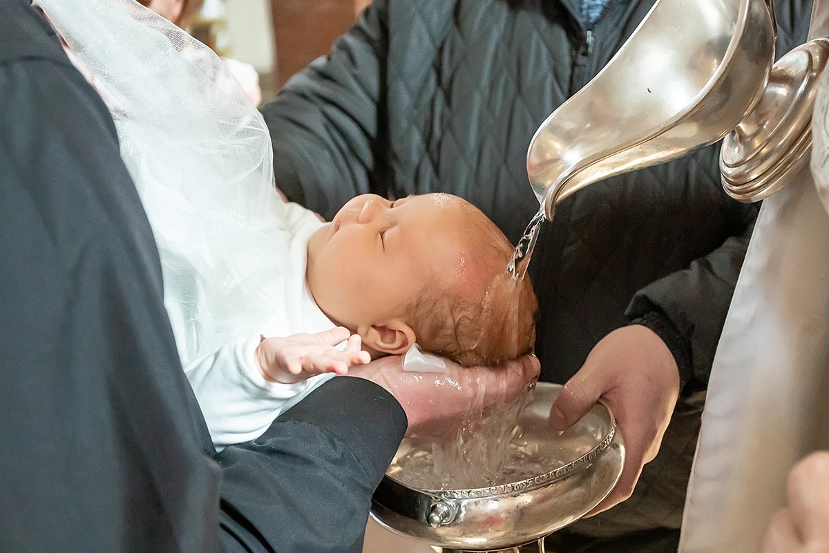 Baptism Ceremony Of Faithful Of The Evangelical Baptist Church In