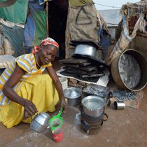 Centenary Christian Aid woman making tea.jpg