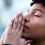 Young man praying