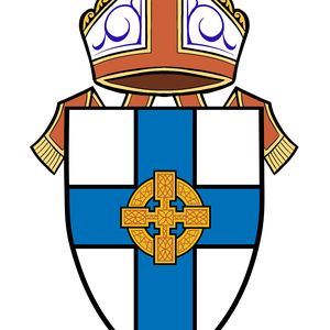 A crest with a shield-like design with a blue cross over it, gold cross in centre, topped with a white, mitre with red and gold edging