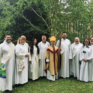 New deacons Charis, Lee, Henry, Sue , Chris, Lloyd, Sian and Lisa  with Bishop Mary