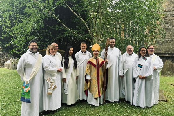 New deacons Charis, Lee, Henry, Sue , Chris, Lloyd, Sian and Lisa  with Bishop Mary